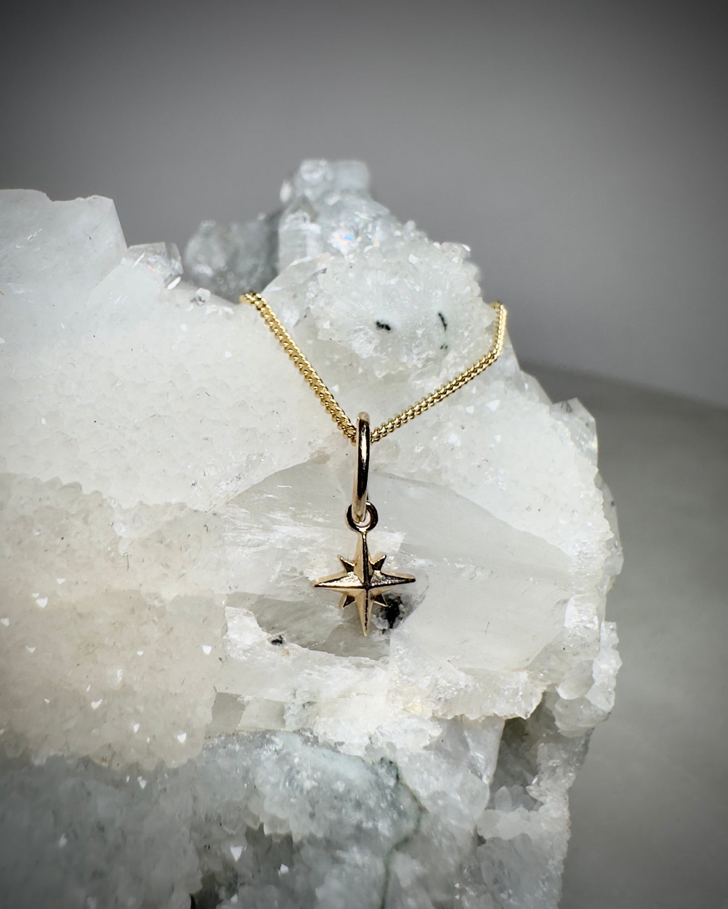 Mini Starburst Charm in 14k Yellow Gold