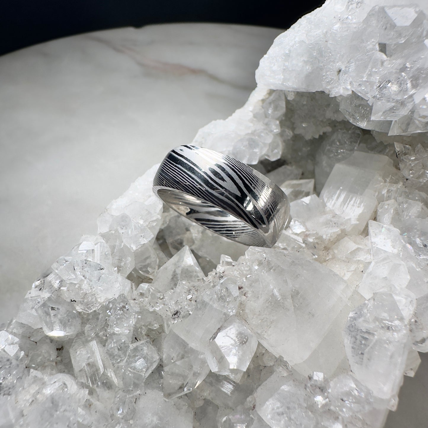 Polished Damascus Steel Ring with Beveled Profile