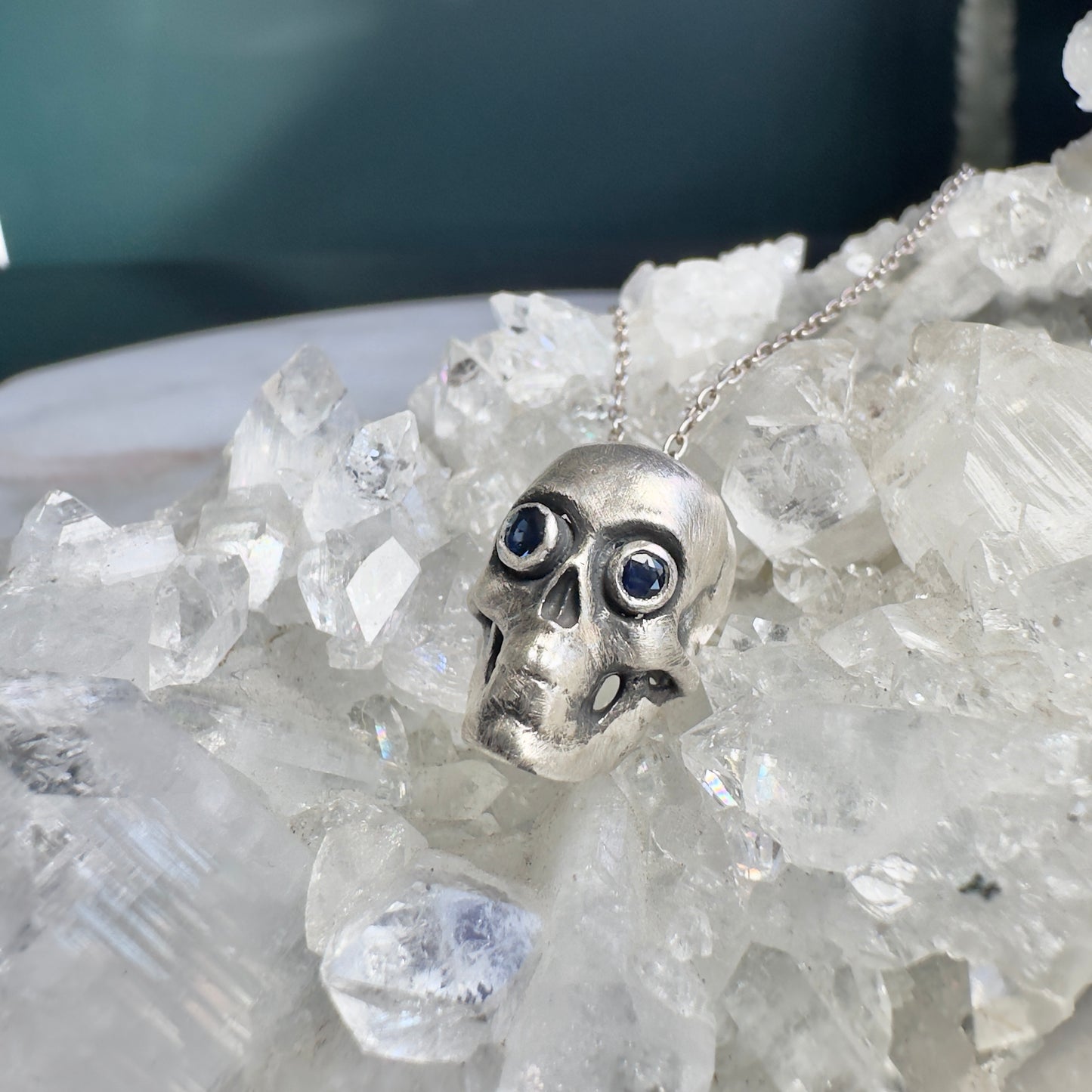 Skull Pendant with Sapphire Eyes